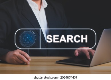 Search concept.Businessman hand holding a magnifying glass to search for information Using Search Console with your website.