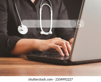 Search Engine Online Concept. Close-up Of Hand A Doctor Using Laptop And Internet For Searching Information On Web Browser