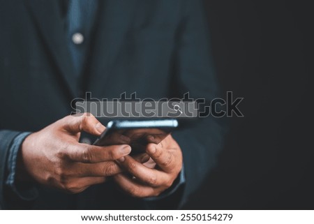 Search Engine Optimisation or SEO concept , Businessman holding smartphone for using input keyword and seraching and find information.