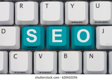 Search engine optimization on the Internet, A close-up of a keyboard with teal highlighted text SEO