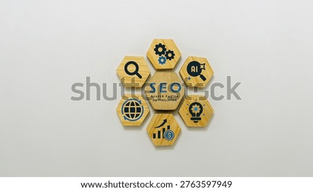 Search engine optimization (SEO)  concept with AI, analytics, growth, and strategy icons on wooden hexagon blocks.