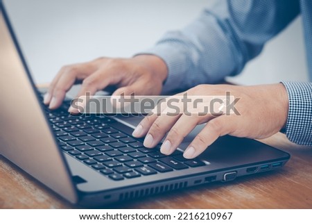 Search Engine Optimization SEO Networking Concept. Searching Browsing Internet Data Information with a blank search bar. Hand of a businessman working with a computer laptop on the desk in an office.