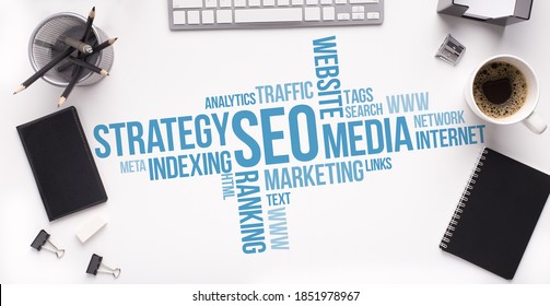 Search Engine Optimization Wordcloud With Words Seo And Internet Terms Over White Office Table Stationery Background. Online Business Marketing Strategy And Technologies Concept. Panorama, Collage