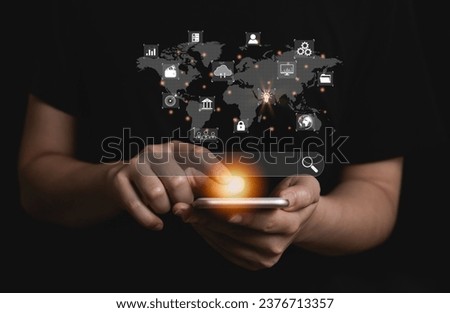 Search engine optimize. man use mobile phone, on virtual screen with SEO icon for analysis SEO Search Engine optimizing your website traffic to rank in search engines SEO. Promoting ranking of world.