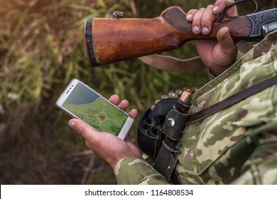 Search For A Hunter While Hunting Geolocation And Location. Phone Navigation. Hunting, Navigation, Location Concept 