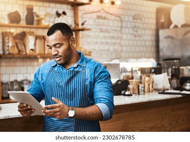 Search, tablet and manager with man in cafe for online, entrepreneurship and startup. Waiter, technology and food industry with small business owner in restaurant for barista, network and coffee shop