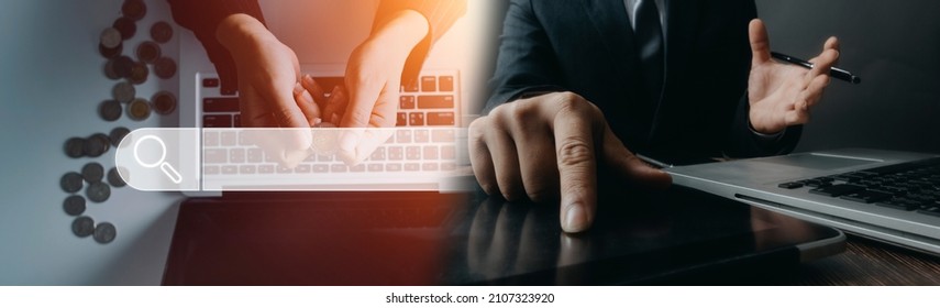 Searching Browsing Internet Data Information with blank search bar.Search Engine Optimization SEO Networking Concept.hand of businessman working with computer laptop on desk in office.