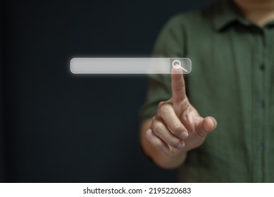 Searching Browsing Internet Data Information Networking Concept,Business man clicking internet search page on computer touch screen,copy space.