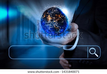 Searching Browsing Internet Data Information Networking Concept with blank search bar.Hand holding Global world network connecte around planet Earth.Elements of this image furnished by NASA