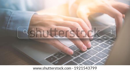 Searching Browsing Internet Data Information Networking Concept, Hand woman using laptop in office.