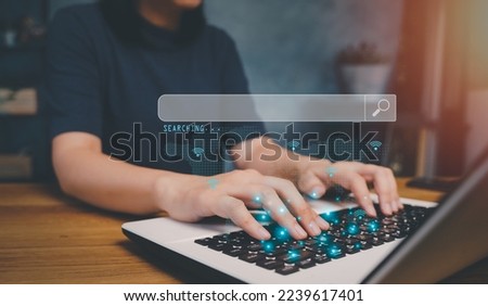 Searching Browsing Internet Data Information with blank search bar.SearchEngine Optimization SEO Networking Concept.handof businessman working with computer laptop on desk in office.