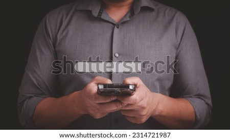 Searching Browsing Internet Data Information with blank search bar. Search Engine Optimization SEO Networking Concept. Hand of business man using smartphone to do job search.