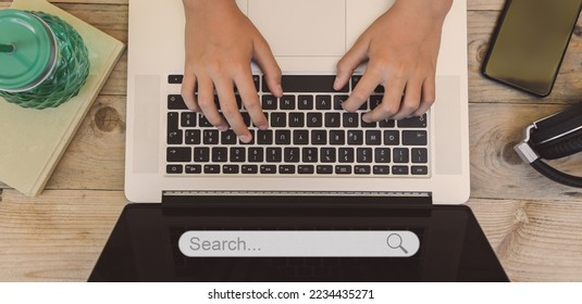 Searching data on internet concept. Working at laptop on desk Finding information online. Search bar