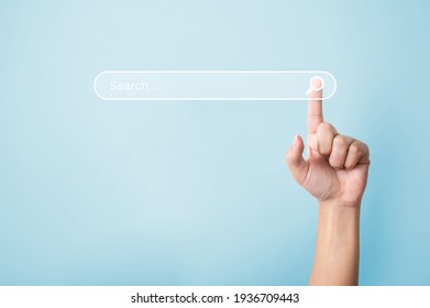 Searching information data on internet networking concept. Hand of man touching magnifying glass icon search - Shutterstock ID 1936709443