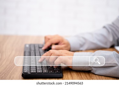 Searching Information Data On Internet Networking Concept. Man Typing Desktop Keyboard Fine Data In Internet On The Table With Texture And Copy Space