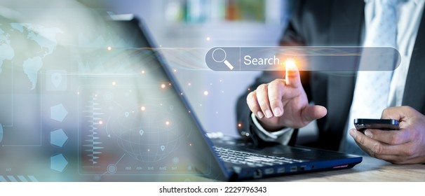 Searching information data on internet networking concept. Searching Browsing Internet Data Information with blank search bar. businessman working with clicking internet search page on computer..