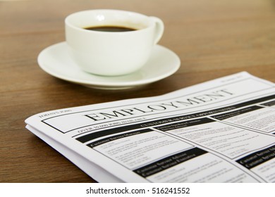 Searching for a new job or employment in a newspaper