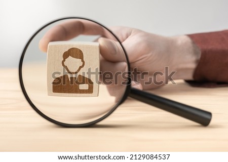 Searching for new team member. Male employer holding magnifier in hand finding job candidate. Recruiting, human resources concept. Search for vacancies and work. Human resources, management.