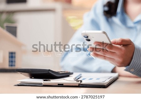 Searching and reading online article document for real estate property. Woman holding smartphone for digital information news and finance research.