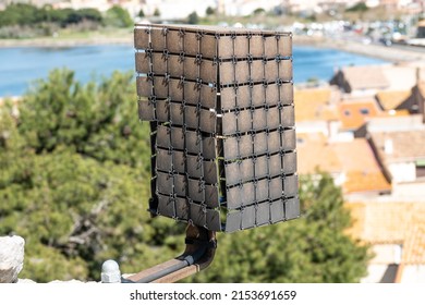 A Searchlight Hidden In A Protective Metal Shell In An Old City. Mediterranean Coast. France.