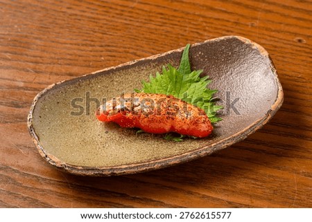 Seared spicy cod roe mentaiko Japanese dish
