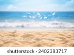 Seascape abstract beach background. blur bokeh light of calm sea and sky. Focus on sand foreground.