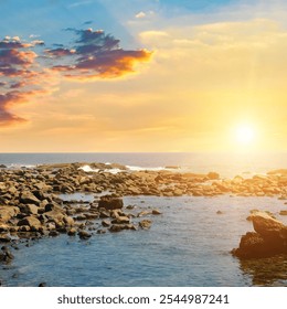 Seascape with beautiful waves, rocky shore and bright sunrise . Concept - vacation and travel. - Powered by Shutterstock