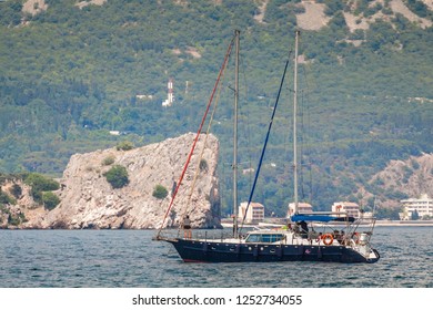 Seascape With Beautiful Yacht And Artek Children Camp At Background. Gurzuf, Crimea.