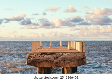 seascape broken part of pier in sea beautiful sunlight at sunset in evening. - Powered by Shutterstock