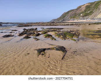 Seascape of Carriagem beach at low tide.