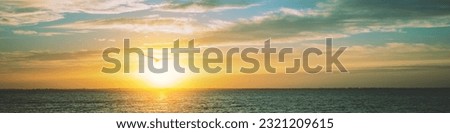 Seascape in the early morning. Sunrise over the sea with beautiful sky