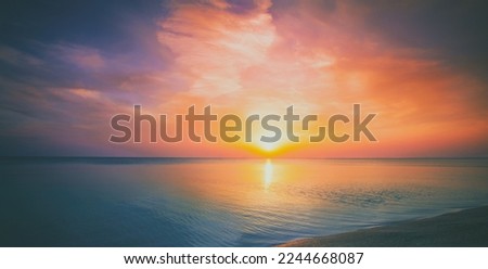 Seascape in the evening, beautiful dramatic sunset over sea. Horizontal banner
