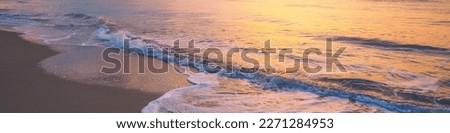 Seascape in the evening during sunset. Nature background. Horizontal banner
