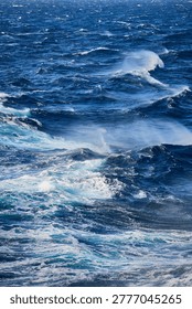 Seascape featuring rows of breaking waves and whitecaps under a clear sky, Aegean Sea, South Aegean, Greece, Europe