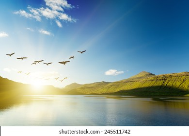 Seascape, mountains on the horizon. The Faroe Islands. The sunrise. - Powered by Shutterstock