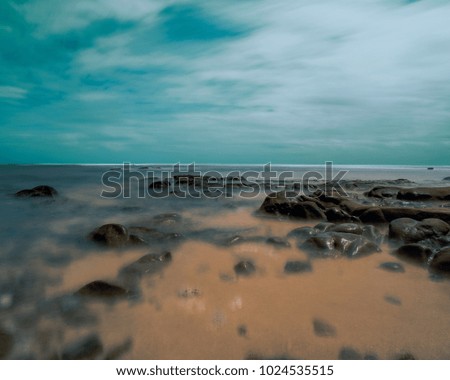 Similar – Image, Stock Photo Beach with orange rocks in a sunset, ribadeo, lugo, galician, spain