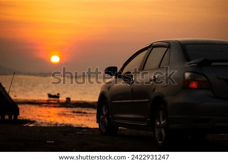 Seascape, sunset and cars background image