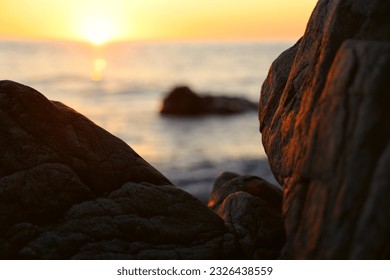seascape sunset sea mountains sun water. Nice sunrise over mountain and lake. Sea landscape. Sunset over the sea rock. Ocean rock at sunrise. 