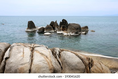 seascape with unusual rock formations in the water   - Powered by Shutterstock