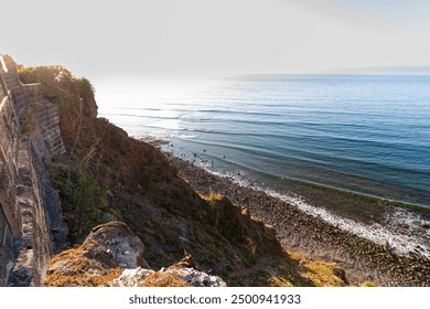 Seascape. Views of Atlantic Ocean from a cliff. Rocky beach. Sunset on the beach. Tenerife, Bajamar, Canary Islands. - Powered by Shutterstock