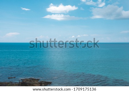 Similar – Sea waves breaking against cliff