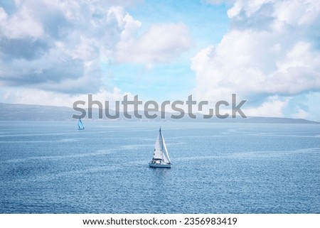 Seascape with white yacht sailing the sea