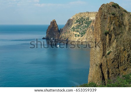 seascape with Yachts on the background of rocks