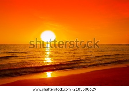 Seascapes of beautiful sunset pink sky on the sea beach on vacation for travel