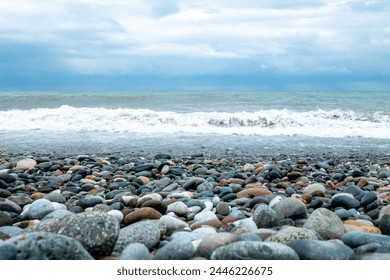 seashore, pebbles, waves, high surf - Powered by Shutterstock