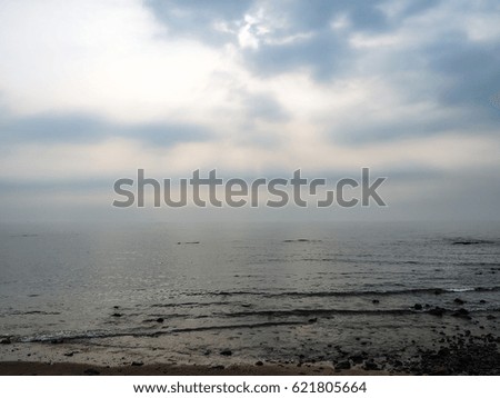 Similar – Grey morning Beach