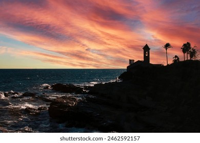 Seaside church perched on rocky cliffs - Powered by Shutterstock