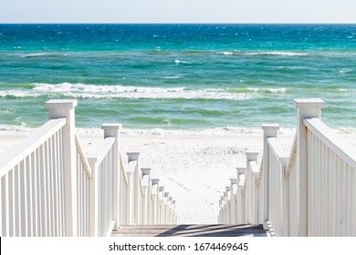 Seaside, Florida Railing Wooden Stairway Walkway Steps Architecture By Beach Ocean Background View Down During Sunny Day