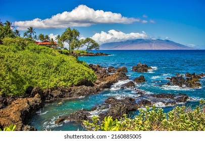 Seaside on a tropical island. Coastal summer landscape. Paradise seashore landscape. Beautiful island coast