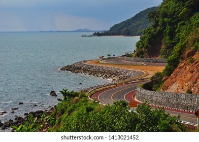 Seaside Road With Cliff Side Road At Curve Road.